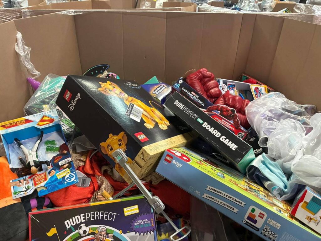 reseller inspecting toy truckloads