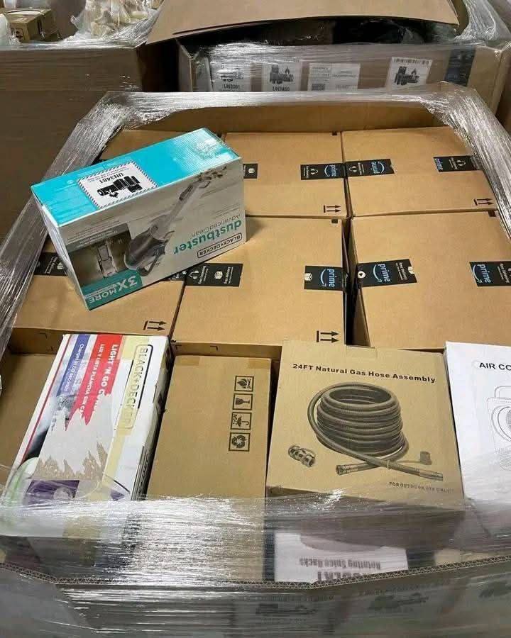 reseller inspecting technology pallets