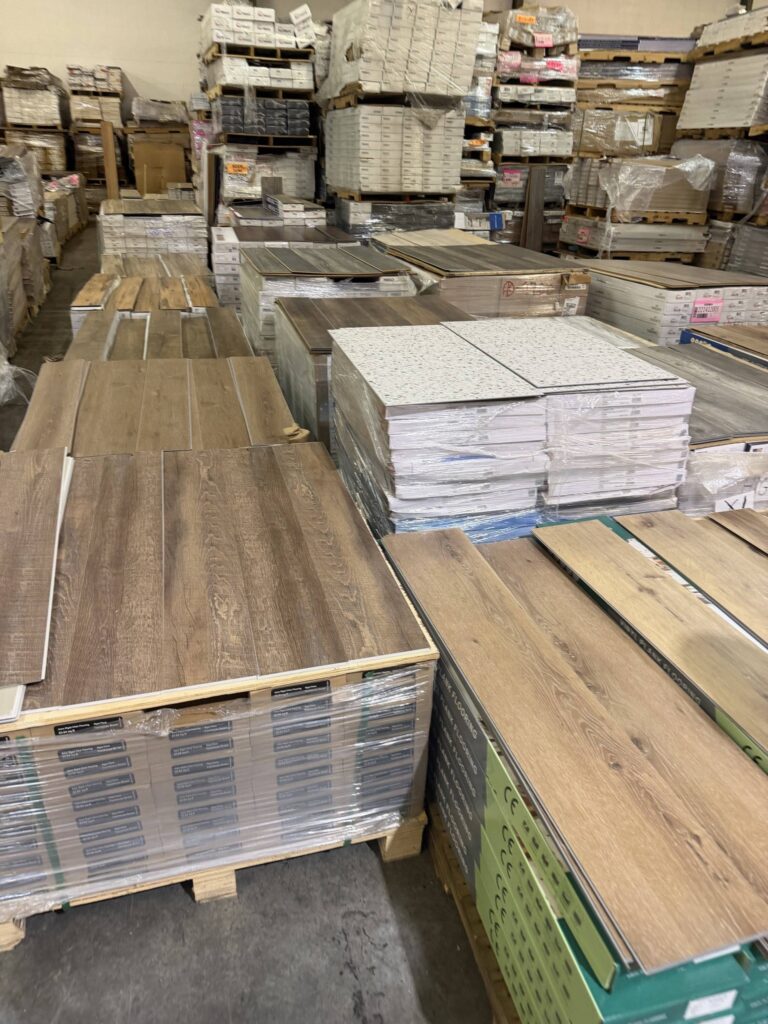 reseller inspecting flooring pallets