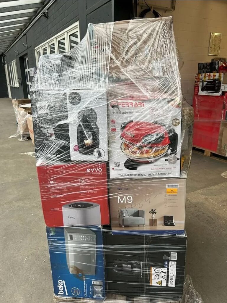 reseller inspecting liquidation pallets