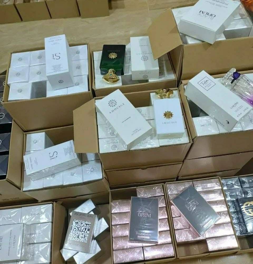 reseller inspecting fragrance pallets