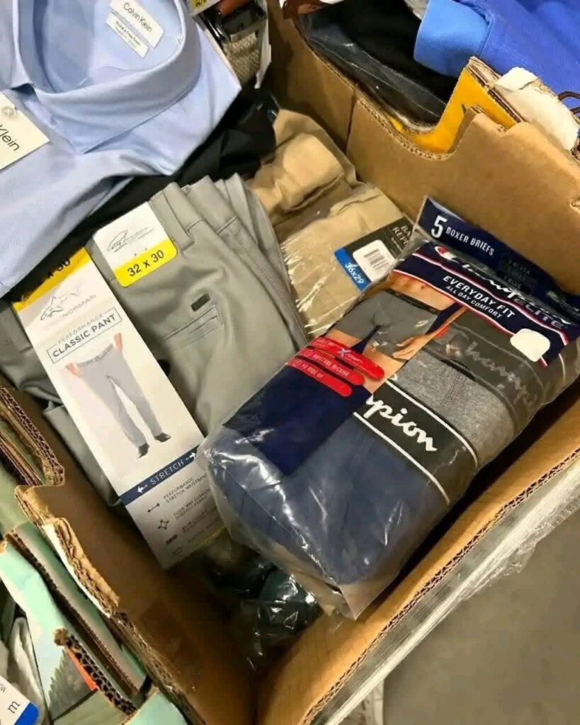reseller inspecting clothing pallets